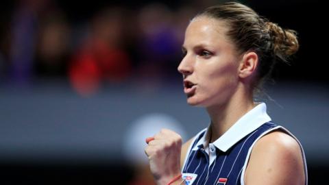 Karolina Pliskova celebrates beating Simona Halep in Shenzhen