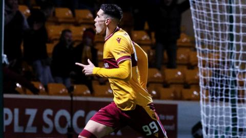 Conor Wilkinson celebrates scoring to make it 3-3 during a cinch Premiership match between Motherwell and Dundee at Fir Park,