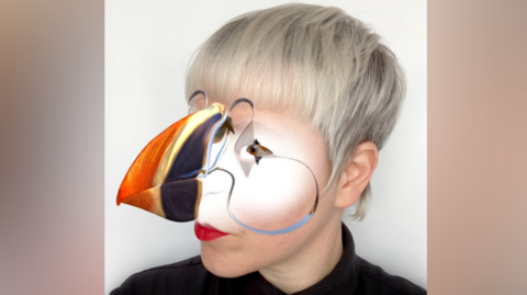 Woman using bird filter