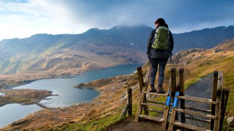 Pyg track path with woman on stile