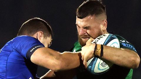 Leinster's Max Deegan tackles Conor Oliver of Connacht