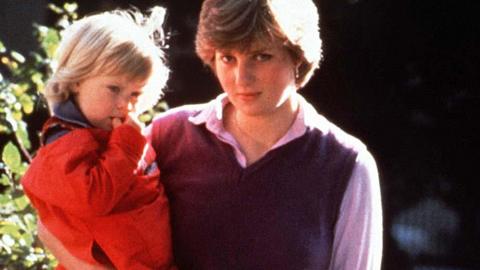 Lady Diana Spencer in 1980, with one of two nursery school children