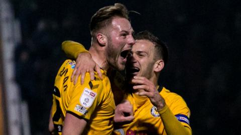 Cameron Norman celebrates his goal