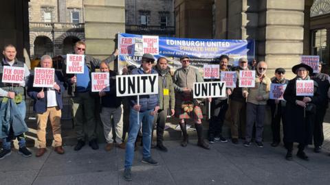A protest involving private hire drivers outside the city chambers in Edinburgh.