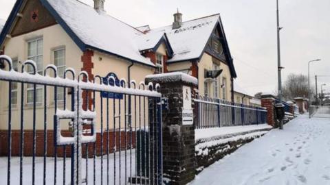 Clsoed gates and snow at Pentyrch Primary School