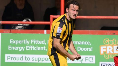 Ruari Paton celebrates his early goal for Port Vale at Exeter City