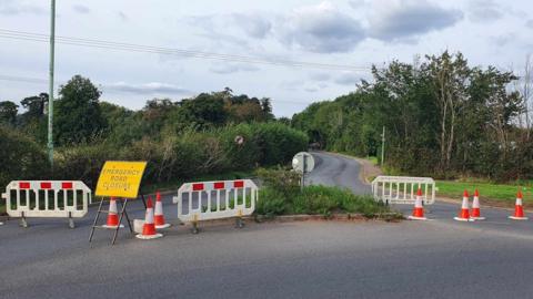 Road closure signs near the scene of the crash on the B1112 at Eriswell, Suffolk