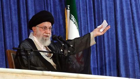 A handout photo made available by the Iranian Supreme Leader's office shows Iranian supreme leader Ayatollah Ali Khamenei during the 33rd death anniversary of the country's late supreme leader Ayatollah Khomeini, at the mausoleum in Tehran, Iran, on 4 June 2022