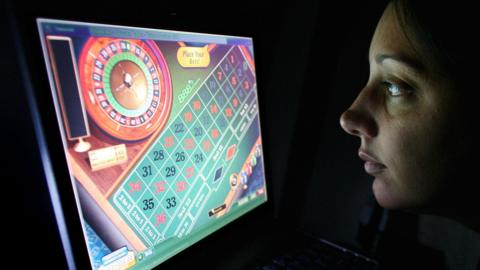 A woman playing roulette online