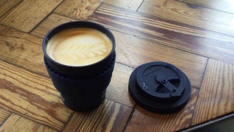 Coffee in a reusable cup