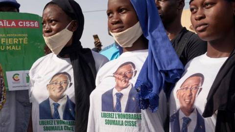 People attend a meeting organized to call for the release of opposition leader Soumaila Cisse in Bamako on July 2, 2020