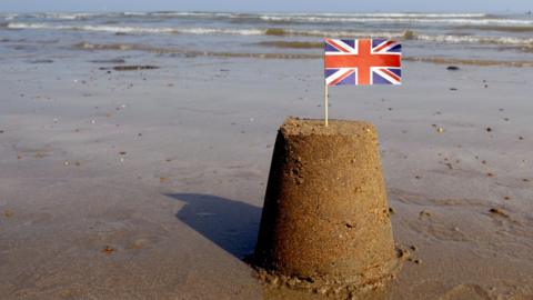 sandcastle with union flag