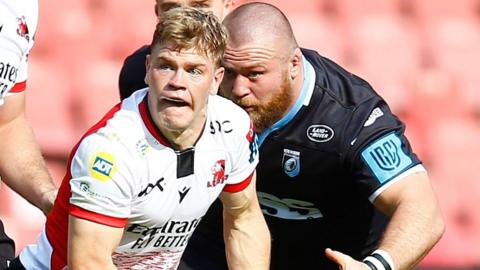 Lions' Morne van den Berg looks to pass as Cardiff's Dmitri Arhip lines up a tackle