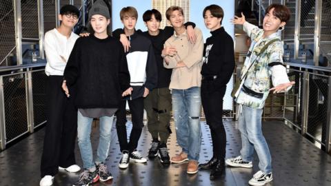 V, Suga, Jin, Jungkook, RM, Jimin, and J-Hope of the K-Pop Group BTS visit The Empire State Building on May 21, 2019