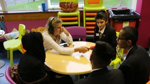 Five Live's Sarah Brett interviews students