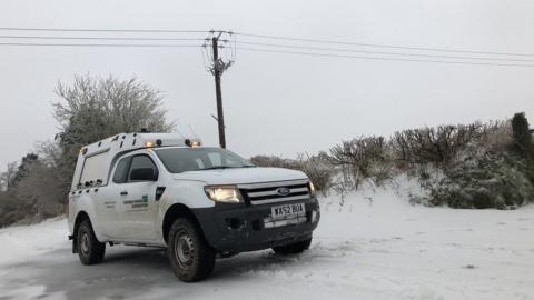 Power crews in the Moorlands in snow