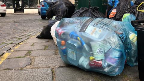 Waste and recycling bags out for kerbside collection in Guernsey