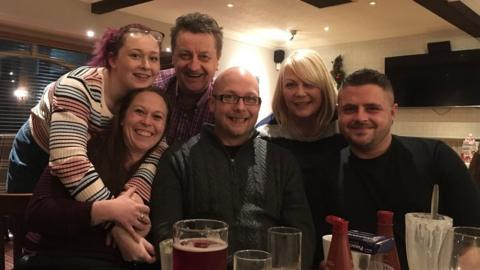 David Yeomans (centre), owner of the Crown Inn, Keynsham, with his family and friends