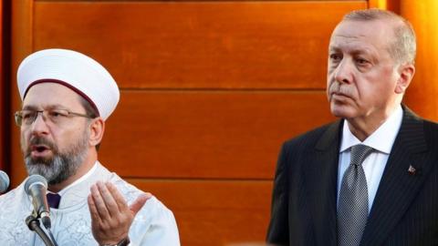 Turkish President Tayyip Erdogan prays at the inauguration of the Cologne Central Mosque in Cologne, Germany on 29 September 2018.