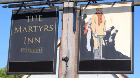 Pub sign for the Martyrs Inn at Tolpuddle