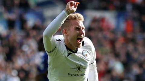 Ollie Cooper celebrates scoring v Cardiff