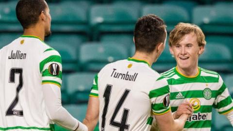 Celtic's Christopher Jullien, David Turnbull and Euan Henderson celebrate