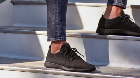 Someone wearing Allbirds Wool Runners shoes