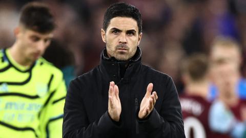 Arsenal manager Mikel Arteta applauds supporters