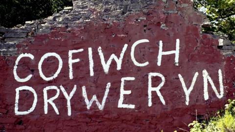 rock with Welsh writing