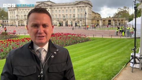 Matt Taylor standing in front of Buckingham Palace, London