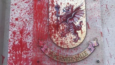 red paint on the somerset crest