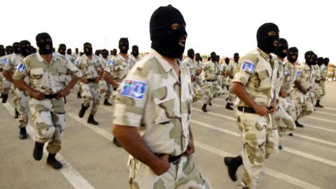 Military parade of forces loyal to Gen Haftar