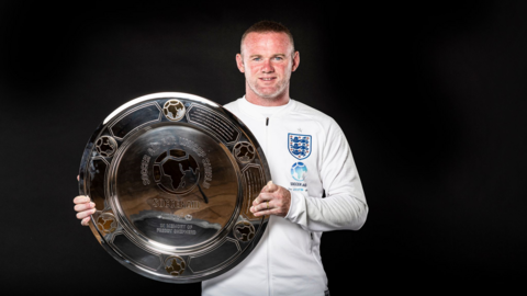 Wayne Rooney with the Soccer Aid shield