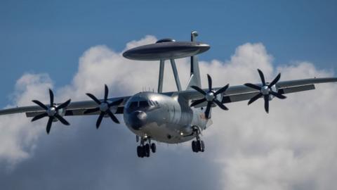 A KJ-500 aircraft flies in the sky before the upcoming Airshow China 2021 on September 24, 2021 in Zhuhai, Guangdong Province of China. Photo by Chen Xiao/VCG.