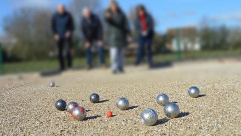 People playing boules