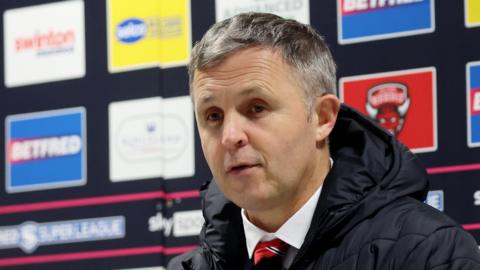 Paul Rowley sitting at a post-match press conference