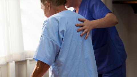 A patient with a care worker