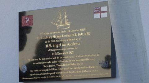 A plaque unveiled to remember HMS Racehorse