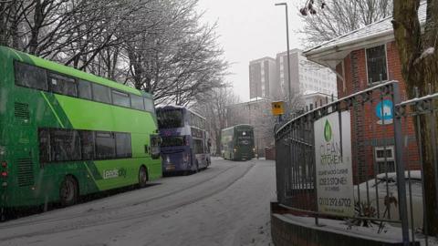 Buses stuck on hill