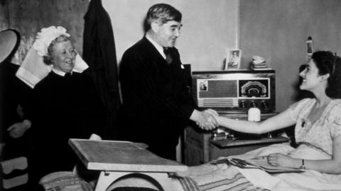 Aneurin Bevan, Minister of Health, meeting a patient at Papworth Village Hospital, following the establishment of the new NHS