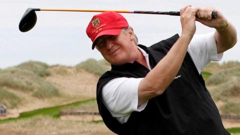 Donald Trump playing golf