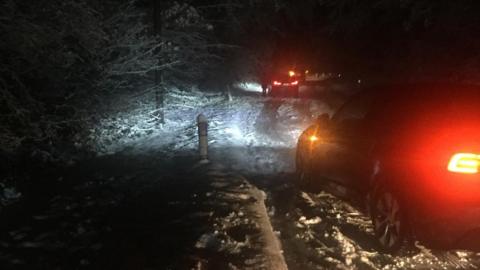 Cars stuck in the snow on the A264