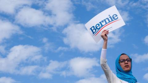 A supporter of Democratic presidential hopeful Vermont Senator Bernie Sanders (not pictured) holds up a sign