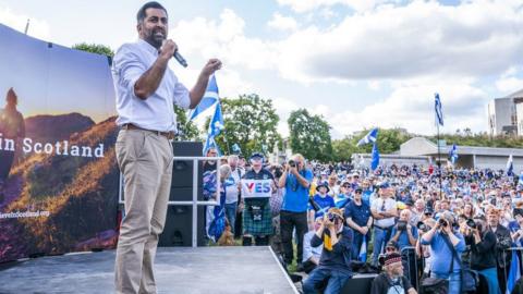 Humza Yousaf speaking at the rally outside the Scottish Parliament