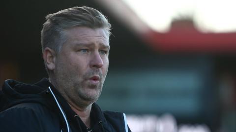Karl Robinson on the touchline for Salford City