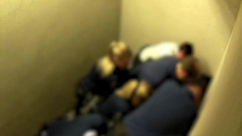 A blurred image shows police holding down Jozef Chovanec after his arrest at Charleroi image