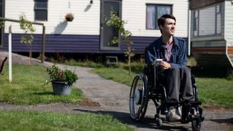 George Robinson playing the character Isaac