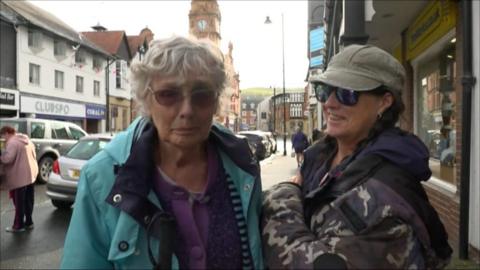 two women on the street in Newtown Powys