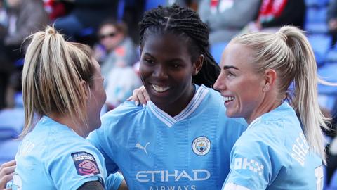 Khadija Shaw celebrates scoring for Man City at Liverpool