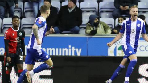 Wigan celebrate v Blackburn